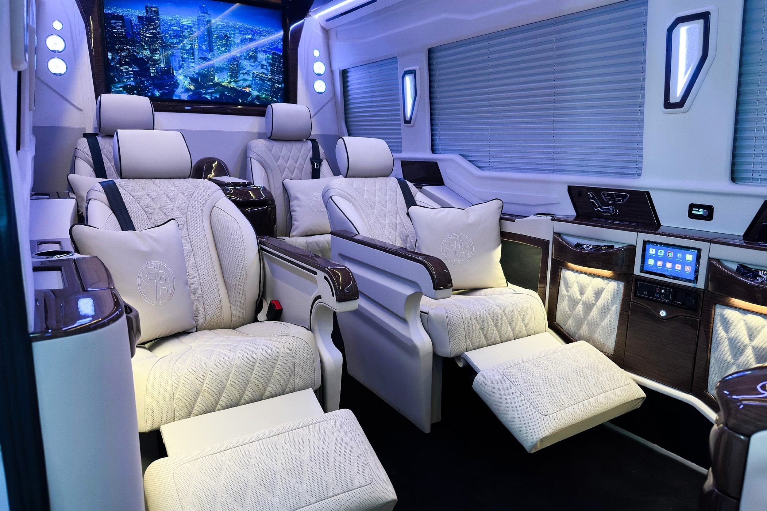 Mercedes Sprinter VIP luxury van interior with leather captain’s chairs, available with driver in Miami